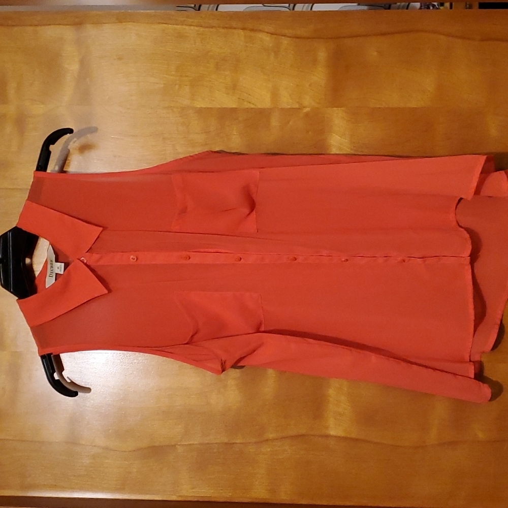 Orange button up see-through sleeveless blouse